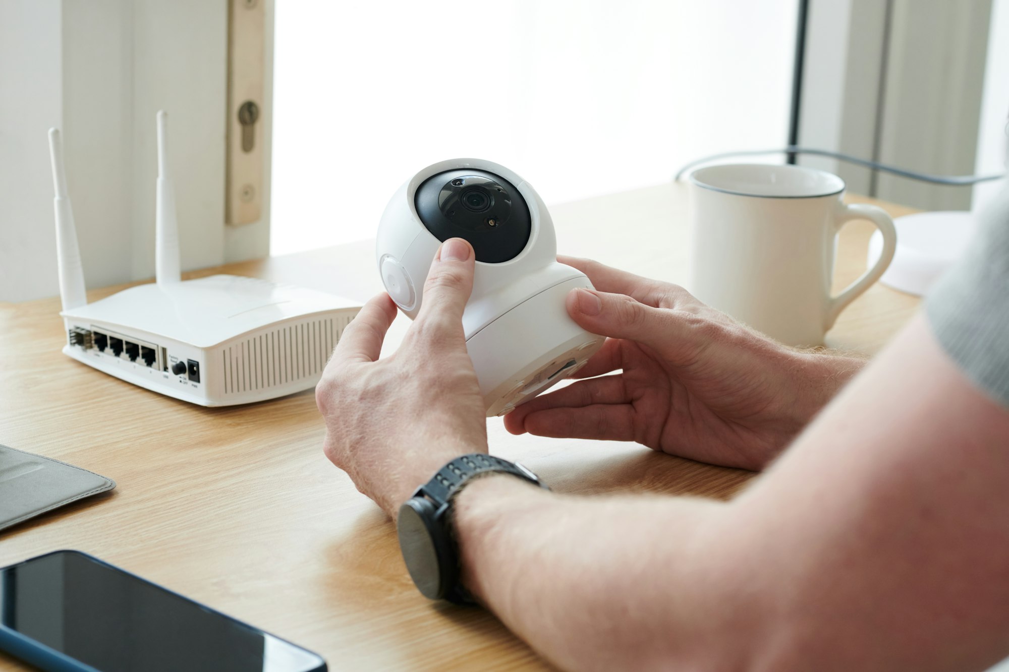 Man Installing Security Camera